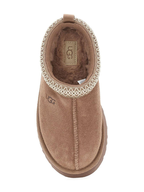 Slippers Tazz per bambini UGG Kids beige con rifiniture intrecciate