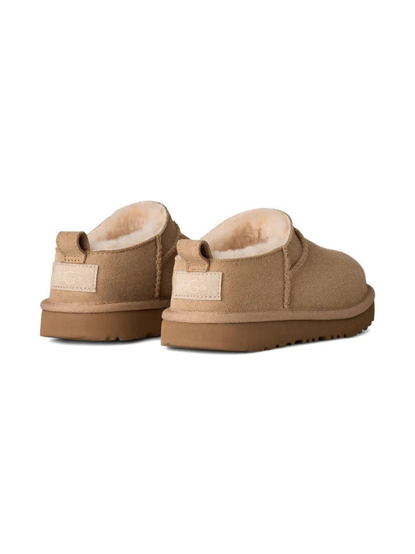 Ciabatte Classic Micro per bambina UGG Kids beige con design slip-on