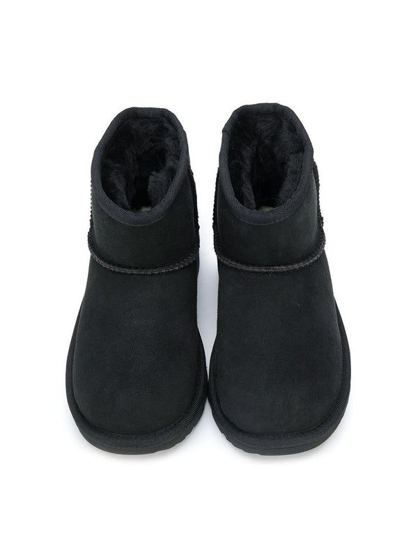 Stivali Classic Mini II per bambina UGG Kids neri con design slip-on