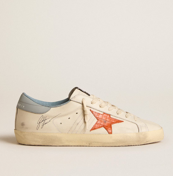 Super-Star Men's with crocodile-print star and silver-blue "LAST PIECES" tag