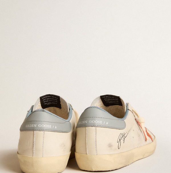 Super-Star Men's with crocodile-print star and silver-blue "LAST PIECES" tag