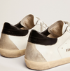 Super-Star with black heel tab and metal studs lettering "LAST PIECES"