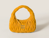 Wander bag in quilted suede