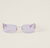 Miu Miu Logo sunglasses with light pink lenses