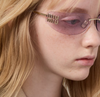 Miu Miu Logo sunglasses with light pink lenses