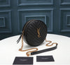 YSL ROUND VINYLE CAMERA BAG IN BLACK LEATHER