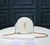 YSL ROUND VINYLE CAMERA BAG IN WHITE LEATHER